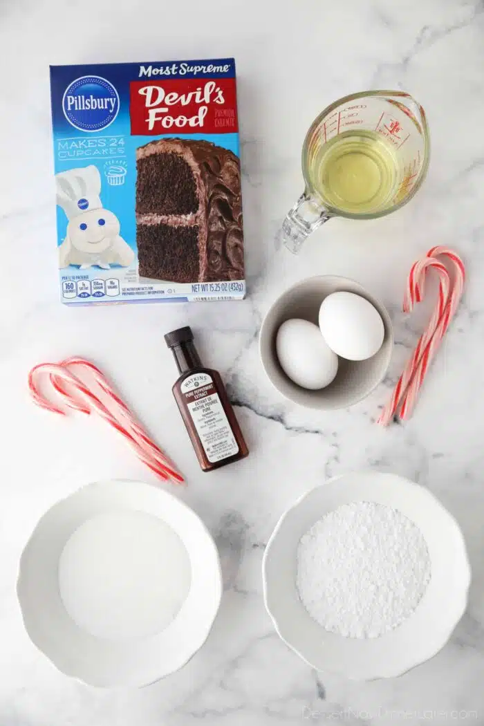 Ingredients to make chocolate peppermint crinkle cookies with cake mix.