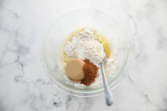 Pumpkin spice streusel ingredients in a bowl.