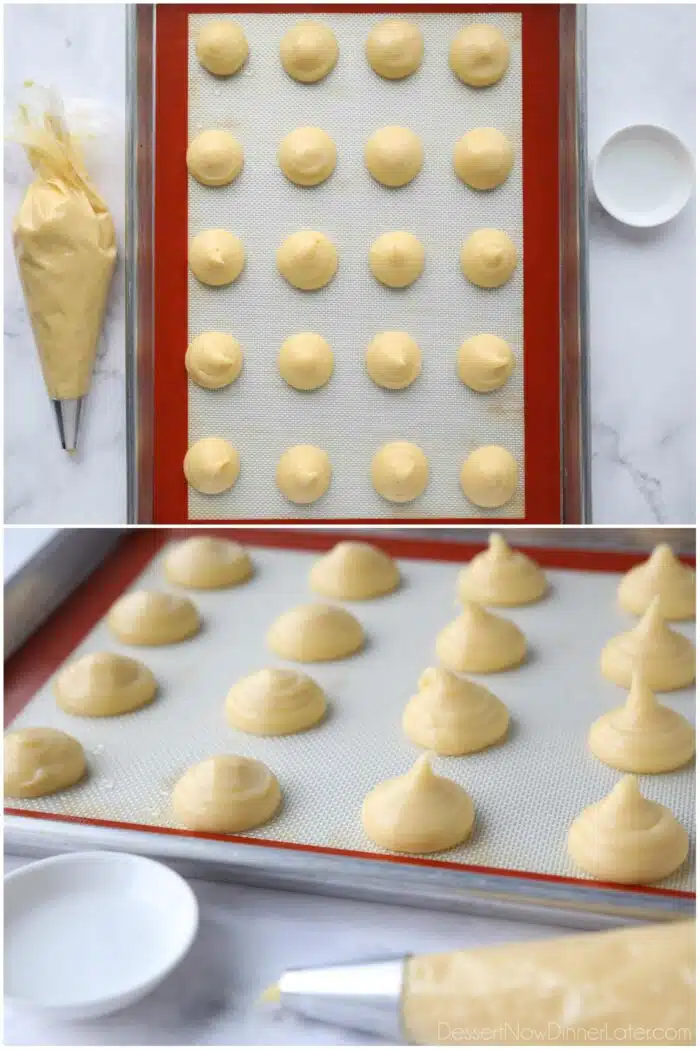 Piping pate a choux into cream puffs on a sheet tray with a silicone baking mat.