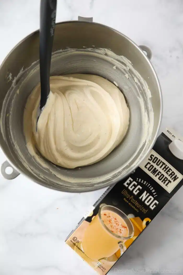 Whipped eggnog pastry cream in a mixing bowl.