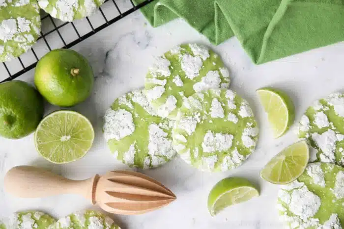 Crinkle-style lime cookies with powdered sugar.