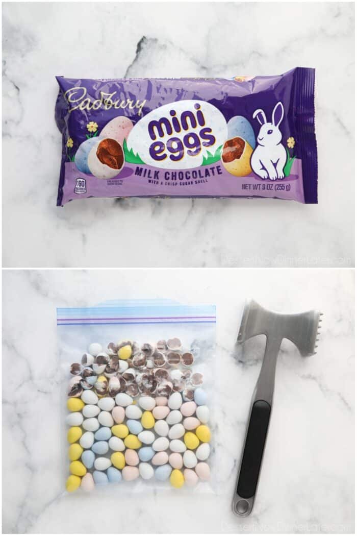 Cadbury Mini Eggs candies in a bag being broken into smaller pieces with a meat mallet.