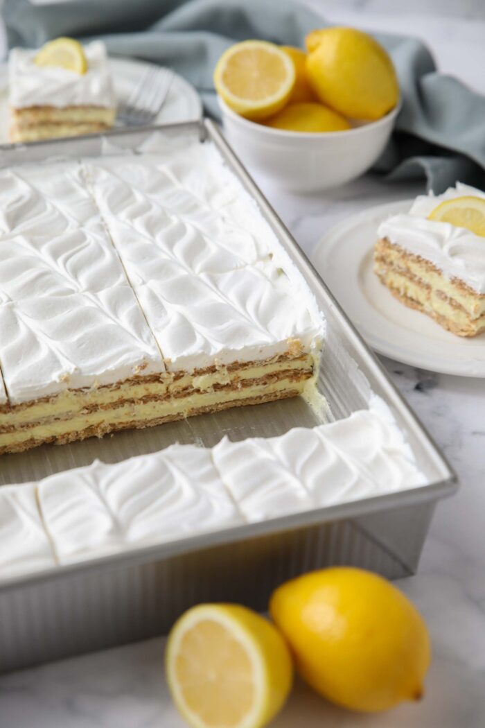 Refrigerated dessert in pan with layers of graham crackers, lemon pudding, and whipped topping.