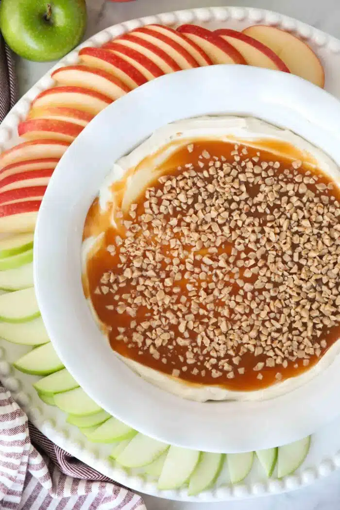 Top view of cream cheese, caramel, and toffee dip in a bowl.