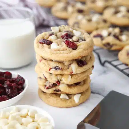 Stack of white chocolate cranberry cookies.