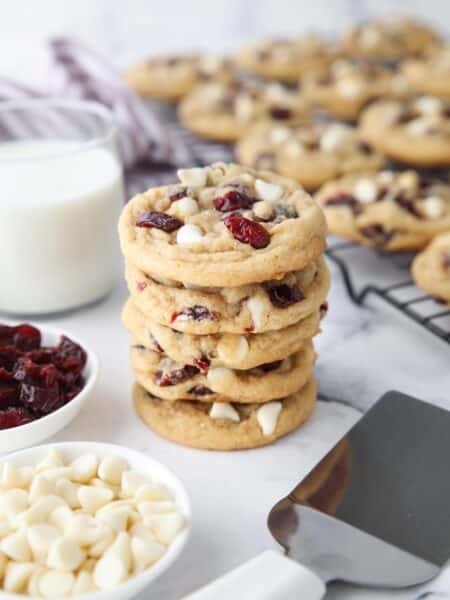 Stack of white chocolate cranberry cookies.