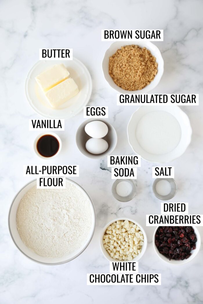 Labeled ingredients needed to make White Chocolate Cranberry Cookies.