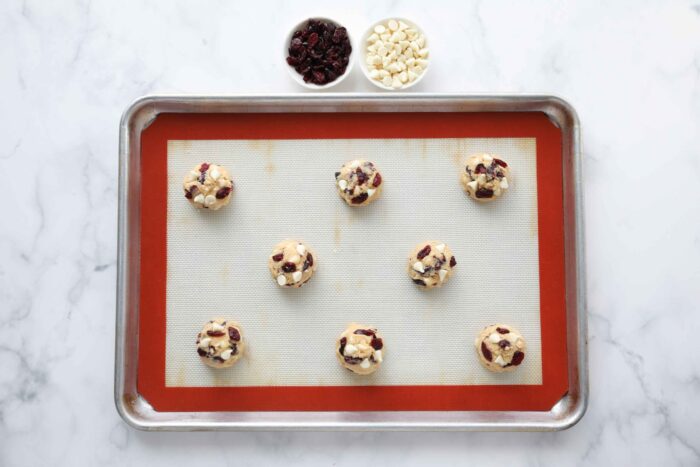 Cookie dough on a baking sheet.