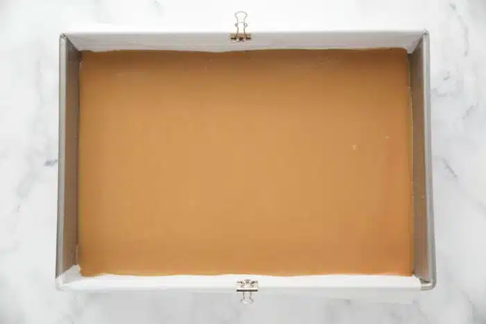 Caramel spread evenly in pan.