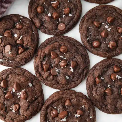 Top view of chocolate cookies with chocolate chips and sea salt.