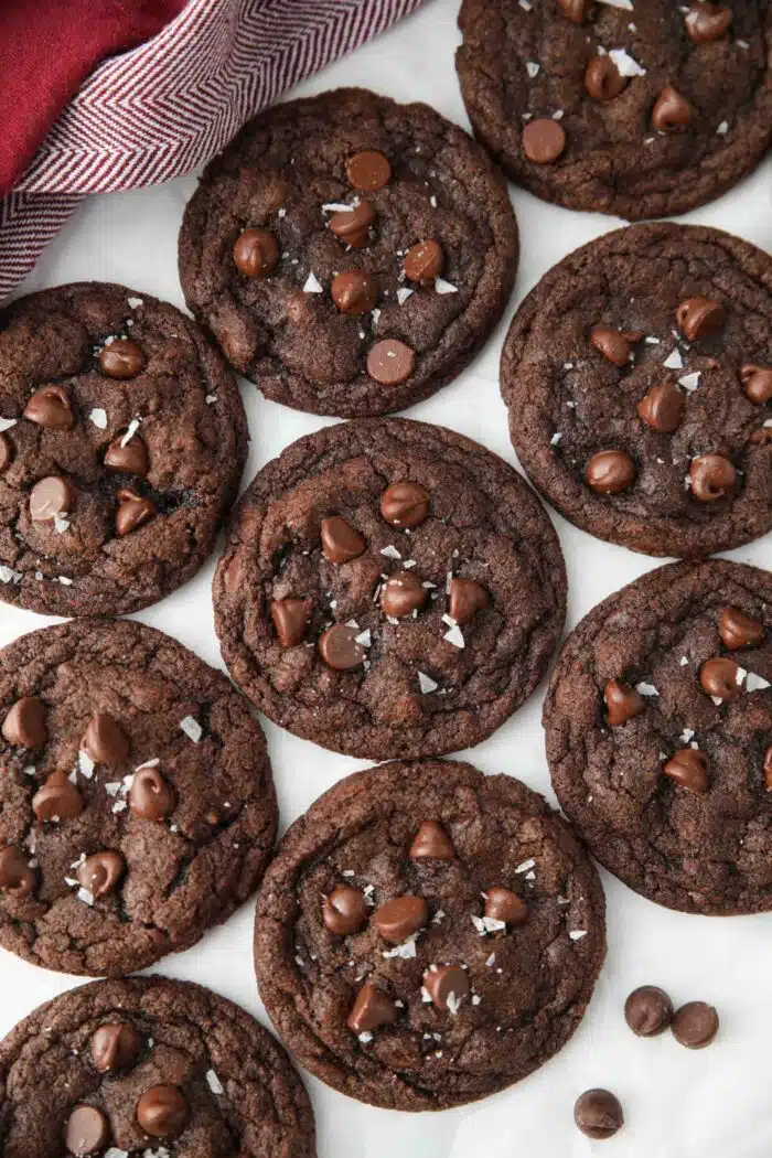 Top view of chocolate cookies with chocolate chips and sea salt.