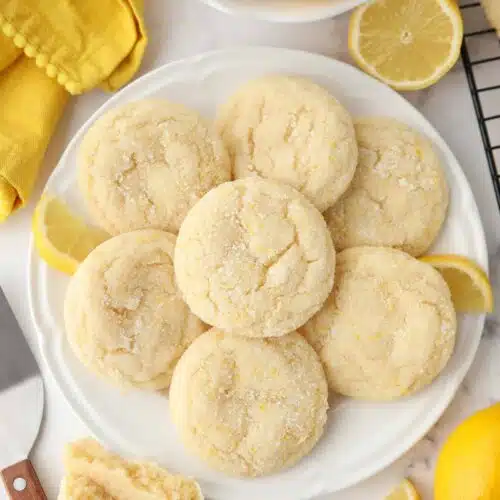 Lemon Cookies on a plate made like sugar cookies with lemon zest.