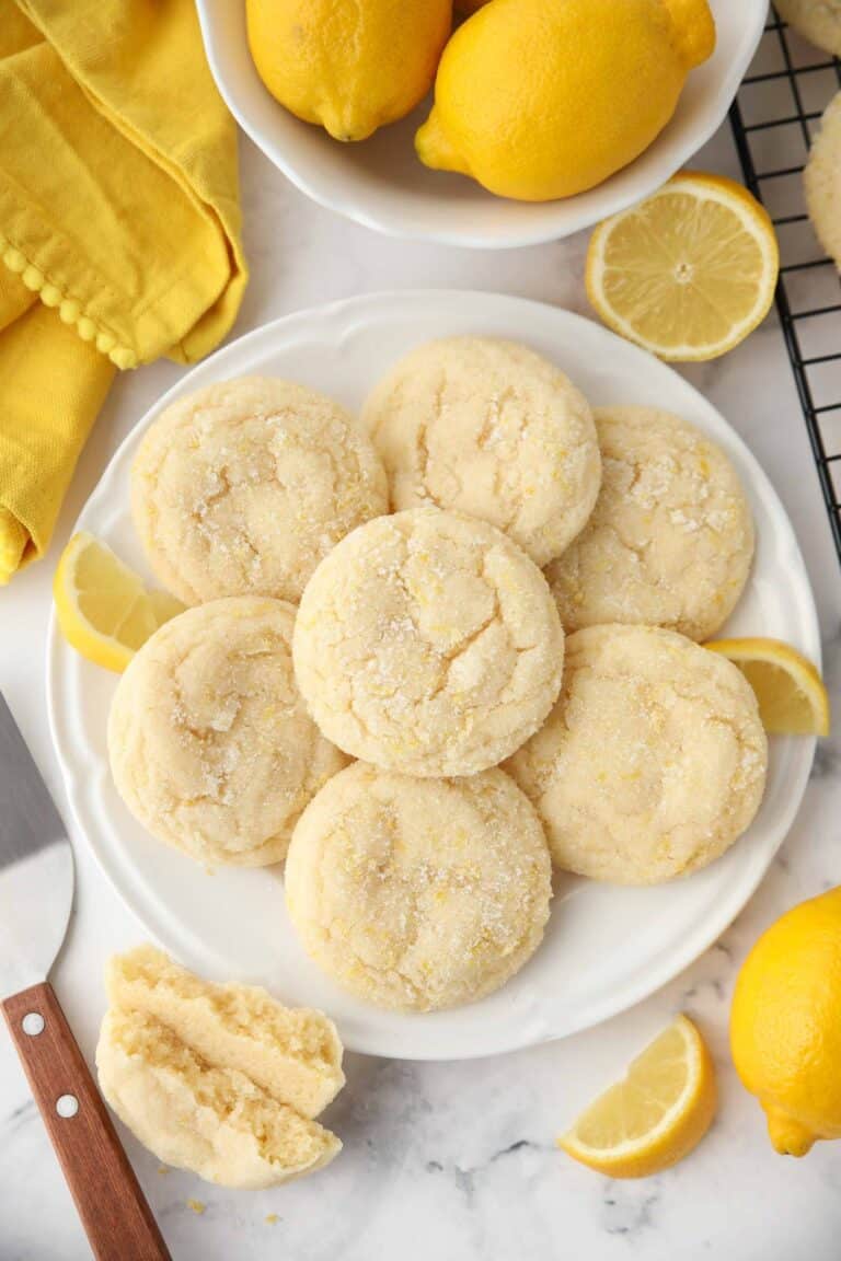 Lemon Cookies on a plate made like sugar cookies with lemon zest.