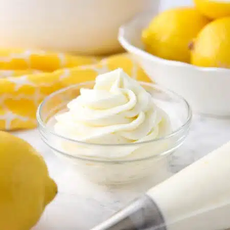 Lemon buttercream frosting piped into a small bowl.