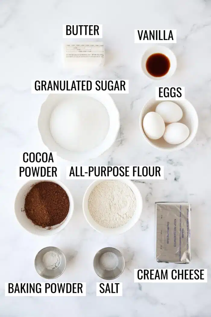 Labeled ingredients needed to make cheesecake brownies.